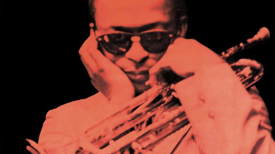 A stylized portrait of jazz musician Miles Davis holding a trumpet, captured in a moment of introspection, emphasizing instrumental music and improvisation.