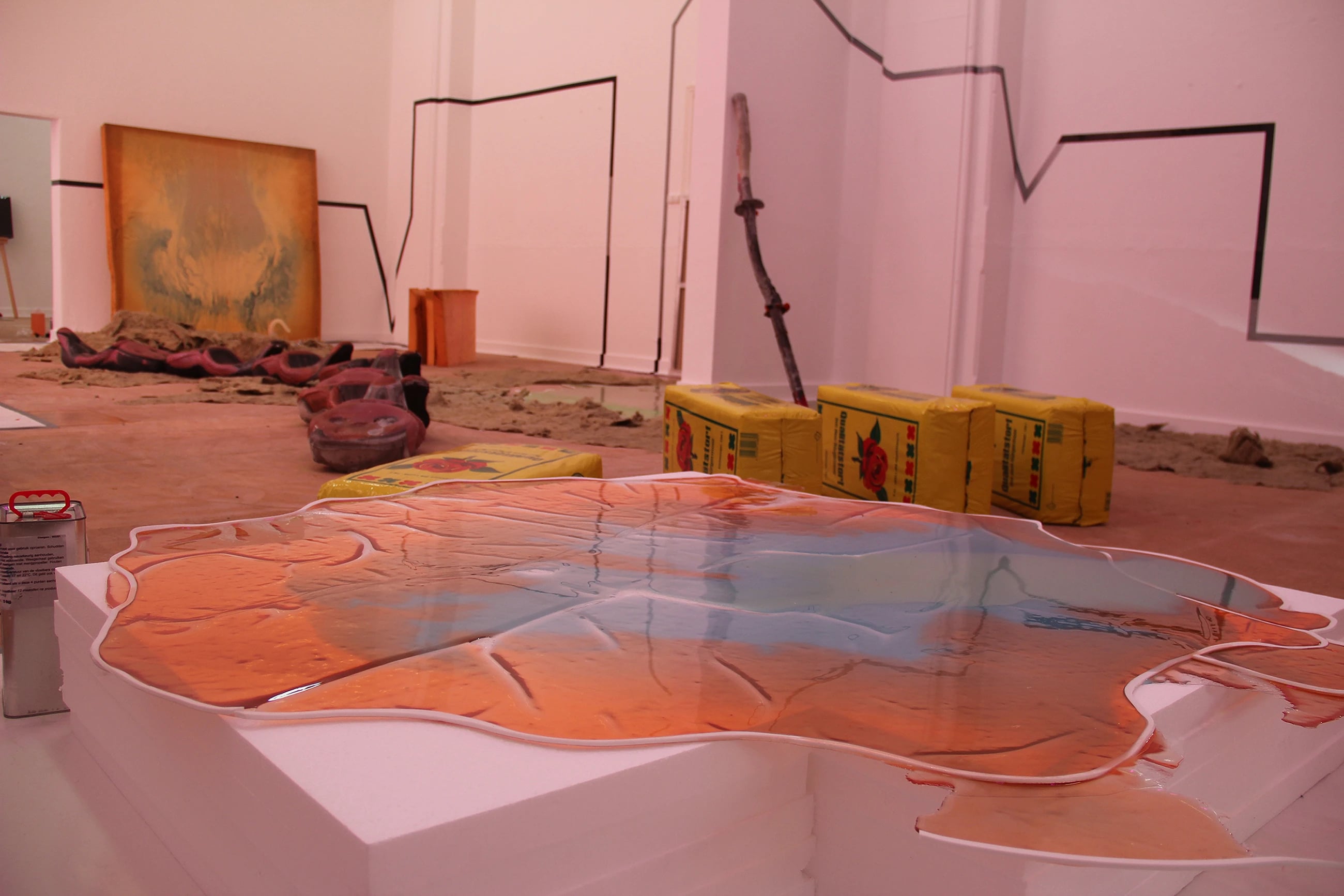 Irene de Boer sculptural installation 'Everything was in Ajar' 2020, epoxy foam resin map with cement bags on gallery floor